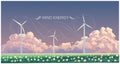Landscape with wind turbines propellers, generating electricity located in a field with flowers, against a cloudy sky