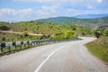 Winding road in the mountains on a summer day. Royalty Free Stock Photo