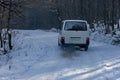 Landscape with winter forest, road and car in the snowy Vitosha mountain Royalty Free Stock Photo
