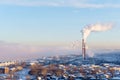 Landscape of a winter industrial zone with smoking chimneys Royalty Free Stock Photo