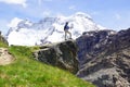 Landscape with with woman with backpack., Switzerland. Royalty Free Stock Photo