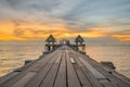 Landscape of Wooded bridge pier between sunset. Summer travel in Royalty Free Stock Photo
