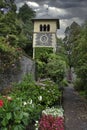 Landscaped garden with a view to picturesque tower Royalty Free Stock Photo