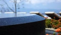 Luxury infinity pool and lounge chairs at Costa Rican premium travel hotel poolside. Royalty Free Stock Photo