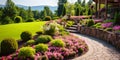 Landscaped home garden with retaining wall, tiled path and flowers in summer, scenery of upscale backyard with walkway, lawn and Royalty Free Stock Photo