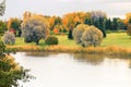 Landscaped Park with lawns and groups of yellow trees Royalty Free Stock Photo