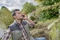 Landscaper over the phone Royalty Free Stock Photo
