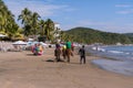 Tourists ride on horses at Boquita de Manzanillo Colima beach in Mexico.