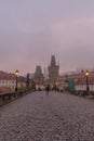 Landscapes on Charles Bridge with Bridge Tower and Statues at sunrise in a foggy morning, Prague, Czech Republic, Europe Royalty Free Stock Photo