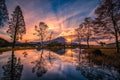 Landscapes image of Mt. Fuji with big trees and lake at sunrise in Fujinomiya, Japan Royalty Free Stock Photo