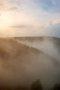 Landscapes of Siberia. Early morning on the Kiya river. Fog over a forest in the mountains. Royalty Free Stock Photo