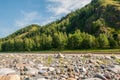 Landscapes of Siberia. Mountains covered with forest on the Kiya river. Royalty Free Stock Photo