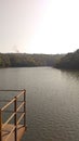 Landscapic view of riverside on an old bridge Royalty Free Stock Photo