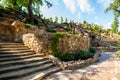 Landscaping. Decorative stone steps down the hill