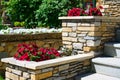 Landscaping on house stairway with flowerbeds, home landscape design Royalty Free Stock Photo