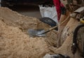 Landscaping sand works on building site. Earth works sand filling Royalty Free Stock Photo