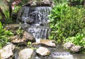 Landscaping - a stone waterfall and pond