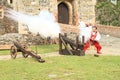 Landsknechts shooting from cannon Royalty Free Stock Photo