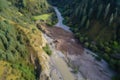 landslide blocks the flow of a river, creating new ecosystem and opportunities for wildlife