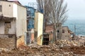 Landslide caused by rains of hurricane destroyed expensive cottages and houses. Destroyed house, cottage, large cracks, chips,