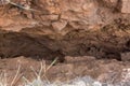 A landslide with cracks in the soil, a close up.