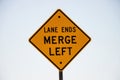 Lane ends merge left sign