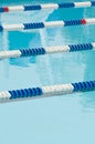 Lane separators in outdoor swimming pool Royalty Free Stock Photo
