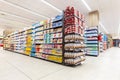 Lanes of shelves with goods products. Packaged biscuits and snacks. Royalty Free Stock Photo