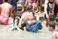 Langalbandh pilgrims bathing in Brahmaputra River