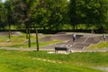 Children and adults ride bicycles and scooters on a special sports track. Sports activity concept Royalty Free Stock Photo