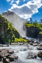 Langfossen waterfall in Norway at sunny summer day Royalty Free Stock Photo