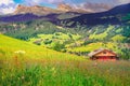 Langkofel and alpine village, Dolomites sudtirol near Cortina d Ampezzo Royalty Free Stock Photo