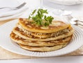 Langos Hungarian pancakes served at restaurant Royalty Free Stock Photo