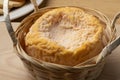 Langres cheese refined with champagne in a basket close up