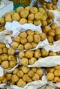 Langsat fruits at the market in Mekong Delta