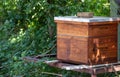A langstroth beehive isolated in a field Royalty Free Stock Photo