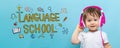 Language school with toddler boy with headphones Royalty Free Stock Photo