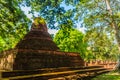 Lanka style ruins pagoda of Wat Mahathat temple in Muang Kao Historical Park, the ancient city of Phichit, Thailand. This tourist Royalty Free Stock Photo