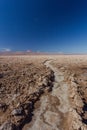 Lanscape of long courved path made of salt stones at Chaxa lagoon at flamingos national park, atacama Royalty Free Stock Photo