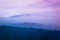 Lanscape photo of wood mountain hills with foggy morning sky Royalty Free Stock Photo