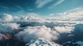 Lanscape shot, panoramic alpine view of low cloudy valley from the top of the mountain to the cliff