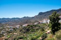 Lanscape view of small spanish town of Tejeda in gran canaria island on mountain valley on summer day with clear blue sky Royalty Free Stock Photo