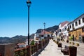 Lanscape view of street in small spanish town of Tejeda in gran canaria island on mountain valley on summer day with view of Royalty Free Stock Photo