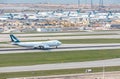 Cathay Pacific`s cargo airplane is running for take off at runway, Cathay Pacific`s