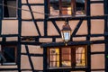 Lantern and typical facade in Riquewhir, Alsace, France