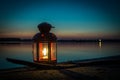 Lantern on the beach at the lake Royalty Free Stock Photo