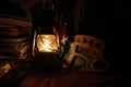 Lantern beside books