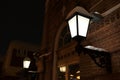 Lantern on brick wall of railway station building Royalty Free Stock Photo