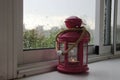 Lantern With A Burning Candle At Home On The Window. The Mood Of Autumn And The Raindrops On The Glass