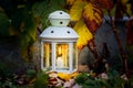 Lantern With Candle In The Autumn Garden In The Evening
